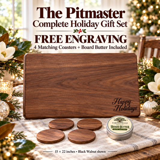 The Pitmaster 15 by 22 inch Complete Holiday Gift Set in Black Walnut with Happy Holidays engraving, four matching hardwood coasters and Board Butter.